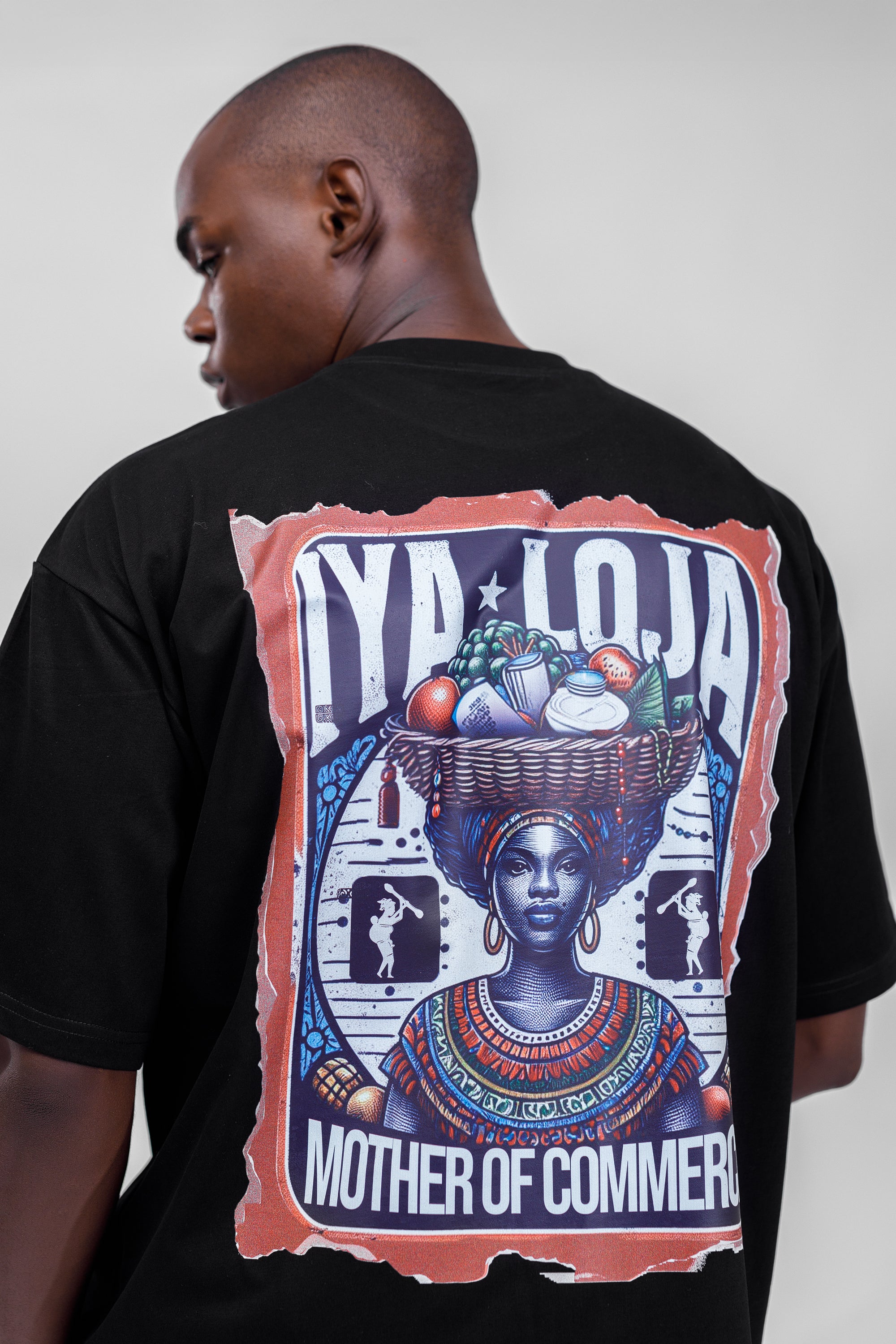 Iyaloja Tee (Pocket Logo) in Black