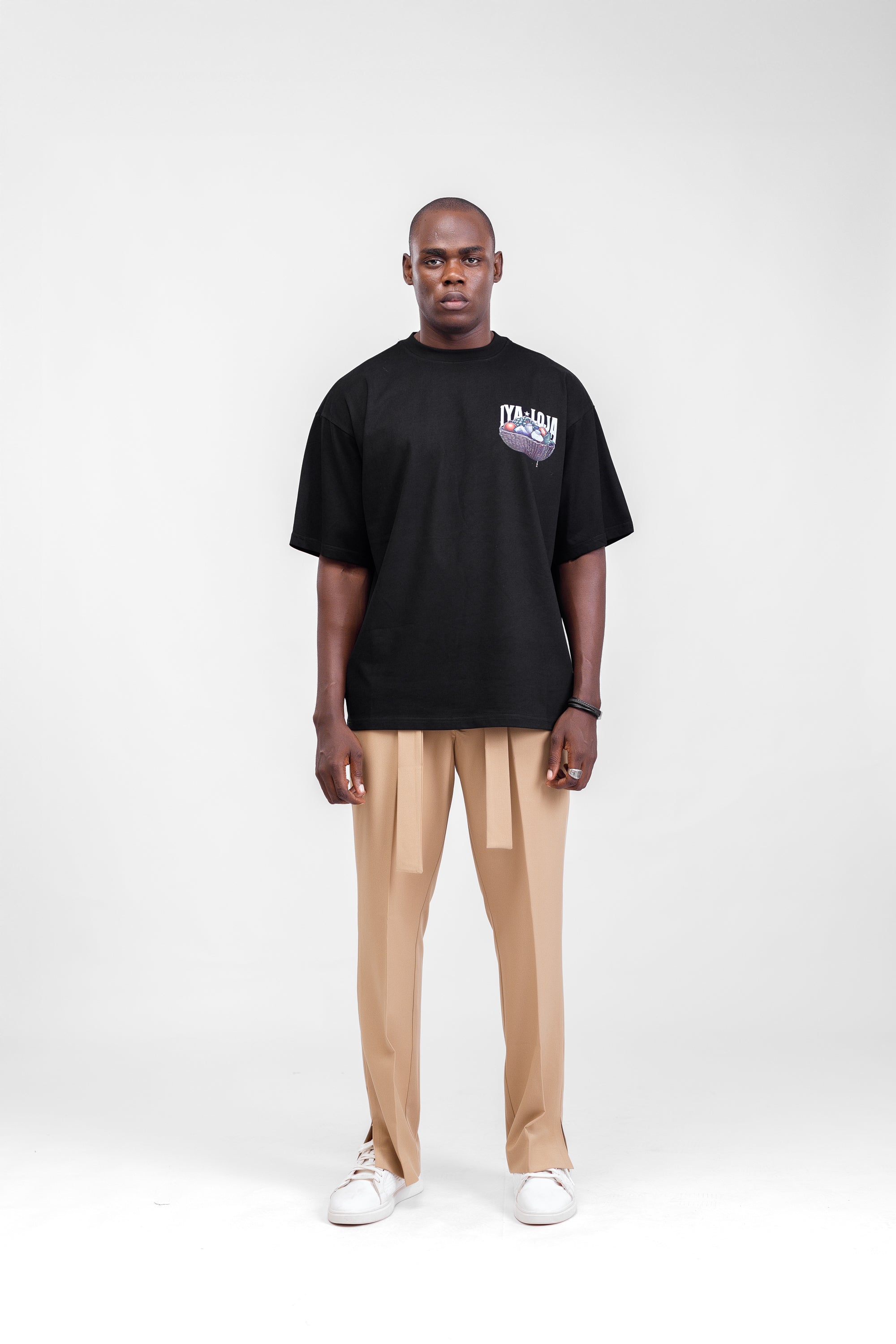 Iyaloja Tee (Pocket Logo) in Black