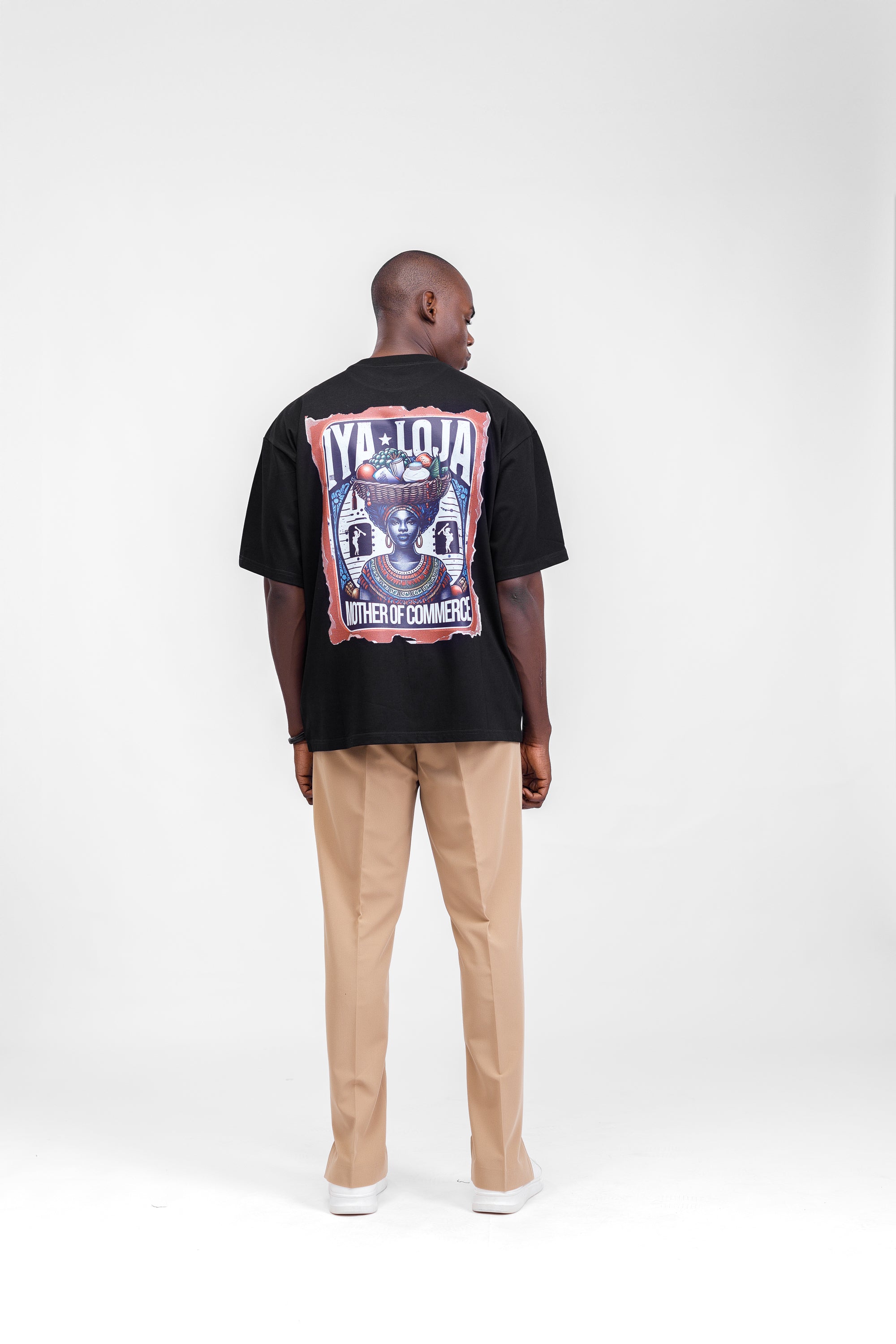 Iyaloja Tee (Pocket Logo) in Black