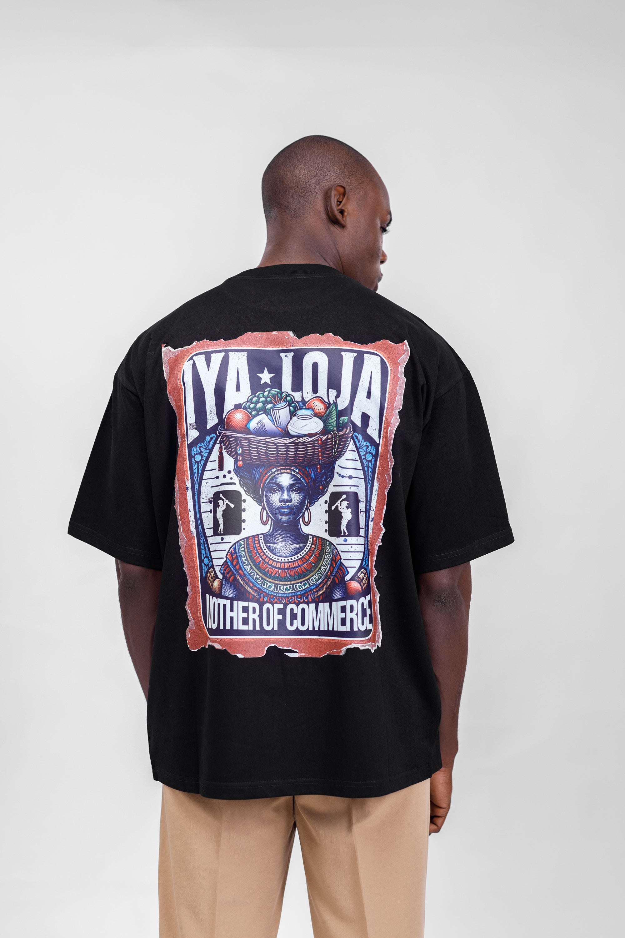 Iyaloja Tee (Pocket Logo) in Black