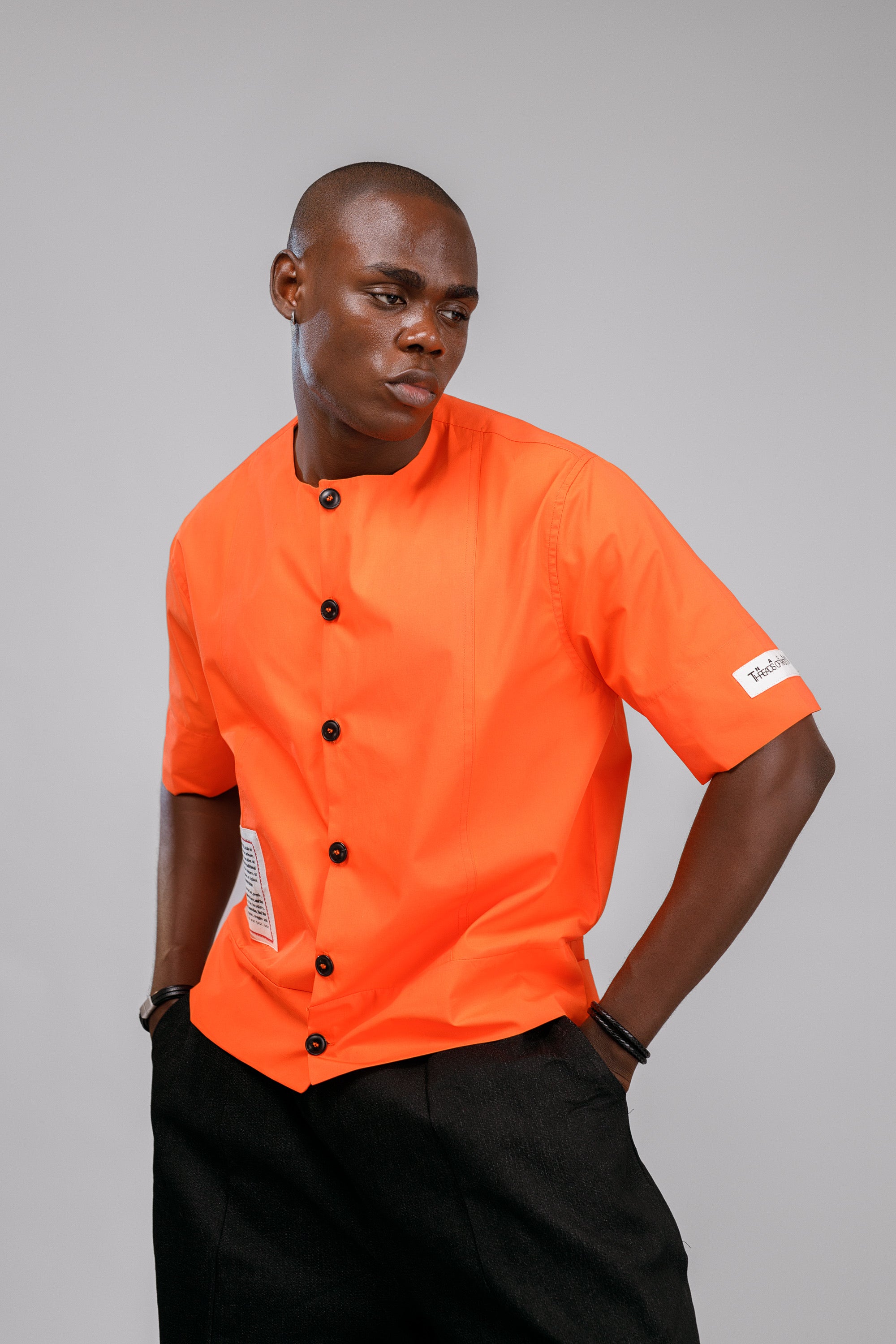 T.O.T SHIRT IN ORANGE (THREADS OF TRADITION)